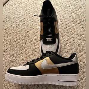 Nike Air Force Low-Top Sneakers in Black White and Gold